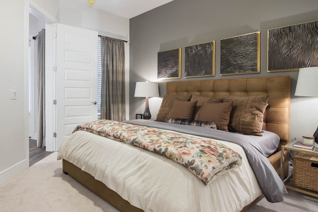 King Sized Bed In Bedroom at The Alastair at Aria Village, Sandy Springs, GA
