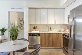 Custom dual-toned cabinetry at Alameda West, Miami, FL, 33144