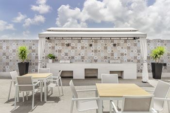 Al fresco dining and grilling areas at Alameda West, Florida, 33144