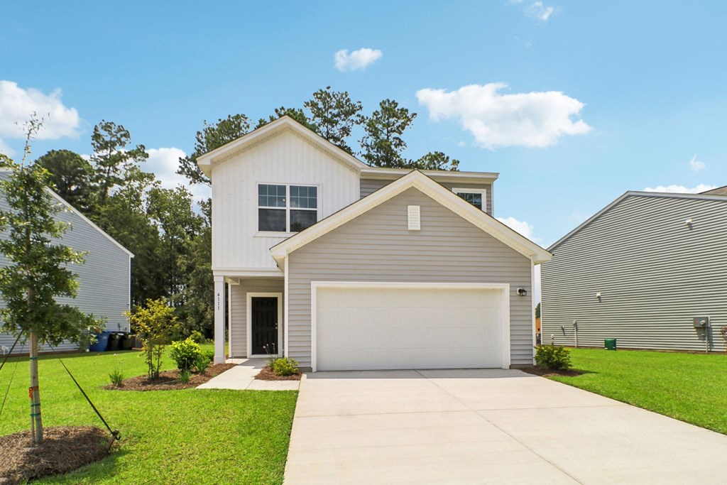 Maple Front view with a spacious driveway at Beacon at Ashley River Landing in Summerville, SC
