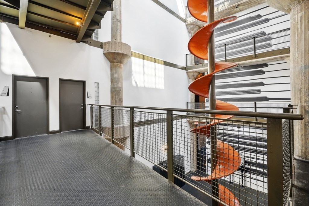 Interior hallway with historic chute from Ford factory | Adam Hats Lofts from Deep Ellum Lofts in Dallas, TX