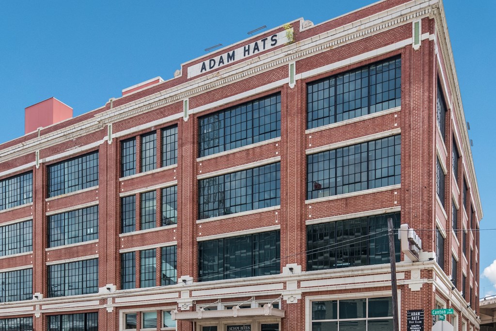 a large brick building with a sign that reads 40mm hass