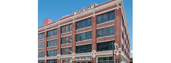 a large brick building with a sign that reads 40mm hass