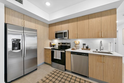 1 Bedroom Unit, kitchen, at Alvorada on the Bay in North Miami Beach, FL