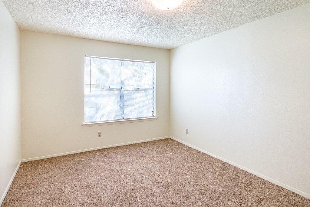 Bedroom at Heritage Square Apartments in Waco, TX