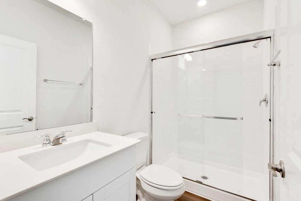 a bathroom with a toilet sink and shower at Beacon at Meridian, San Antonio, TX 78245