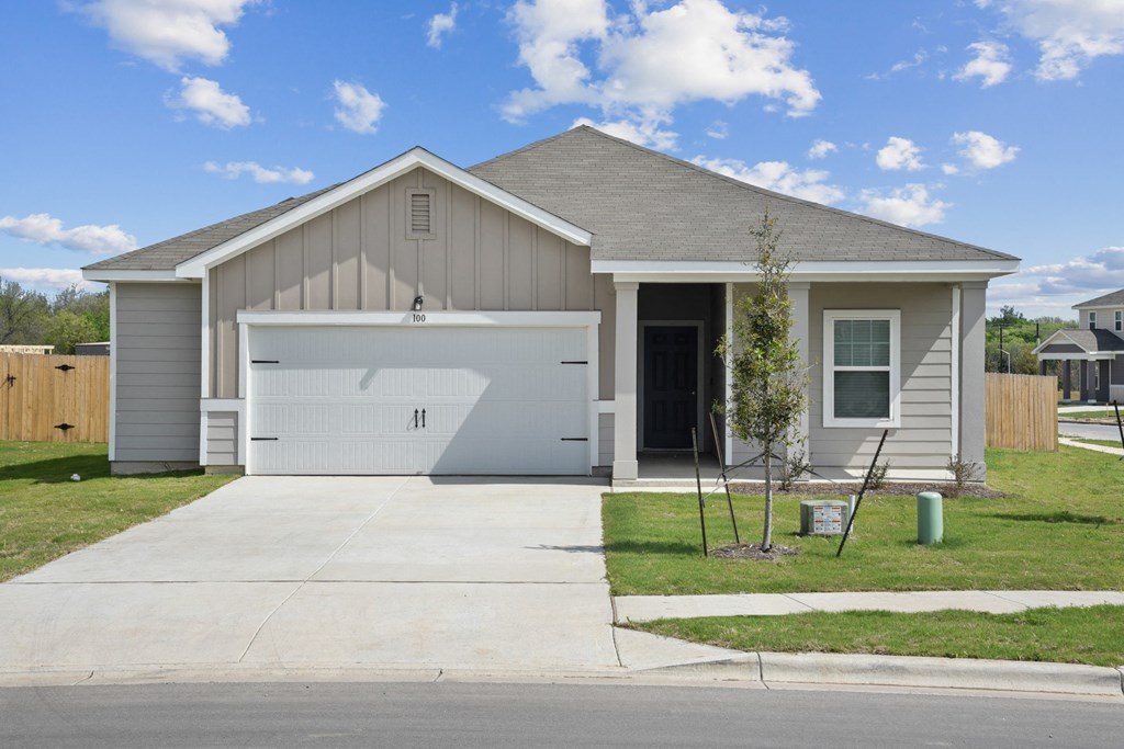 a house with a white garage door at Beacon at Bunton Creek, Kyle, 78640