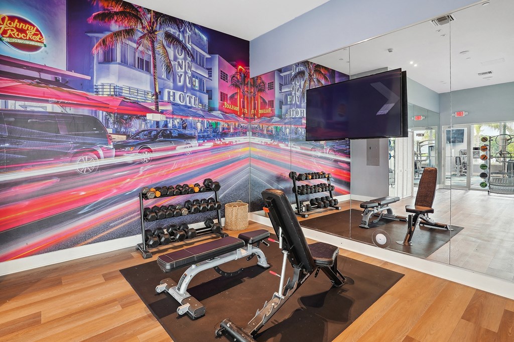 Fitness Center with wall mural at Blue Lagoon 7 in Miami, FL