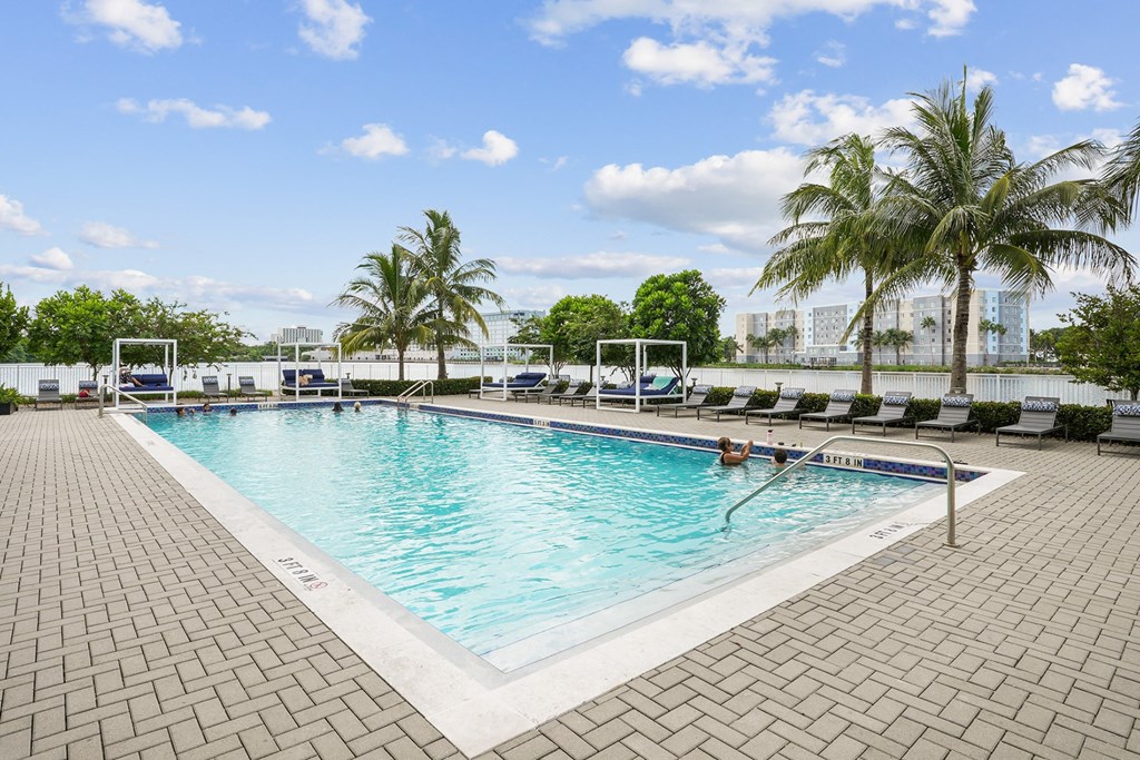 Pool area with palm trees at Blue Lagoon 7 in Miami, FL
