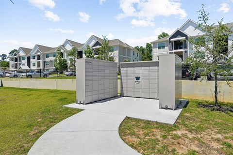 Amazon hub lockers by the apartment buildings for package receiving at Capital Grand Apartments in Tallahassee, FL