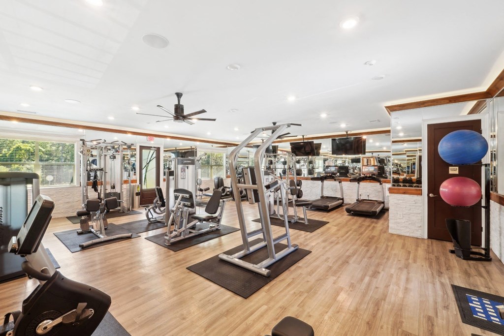 Fitness Center with cardio and strength training machines at Capital Grand Apartments in Tallahassee, FL