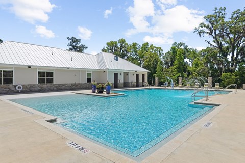 Swimming pool behind the leasing office at Capital Grand Apartments in Tallahassee, FL