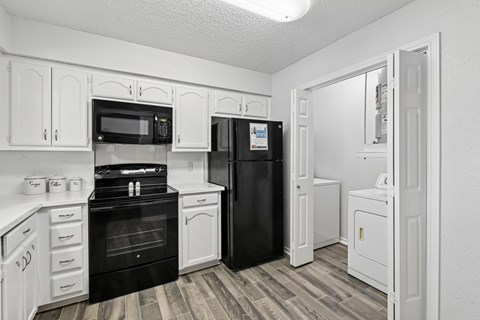 Model unit kitchen at Chisholm Place in Plano, TX