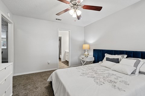 Model unit bedroom at Chisholm Place in Plano, TX