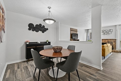 Model unit dining room at Chisholm Place in Plano, TX
