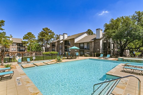 Sparkling pool at Camino del Sol apartments in Denton, TX
