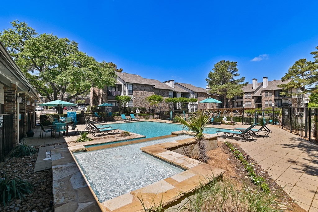 take a dip in the resort style pool at villas at houston levee west apartments