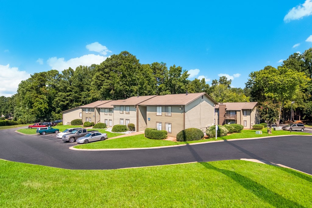 a building with cars parked in front of it