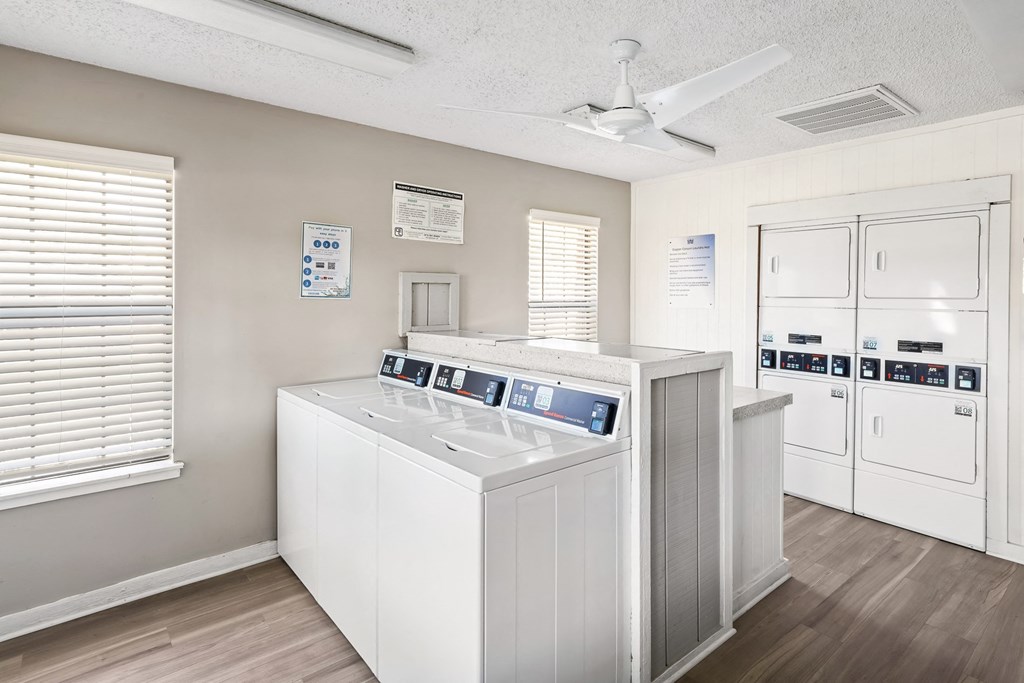 a laundry room with a washer and dryer