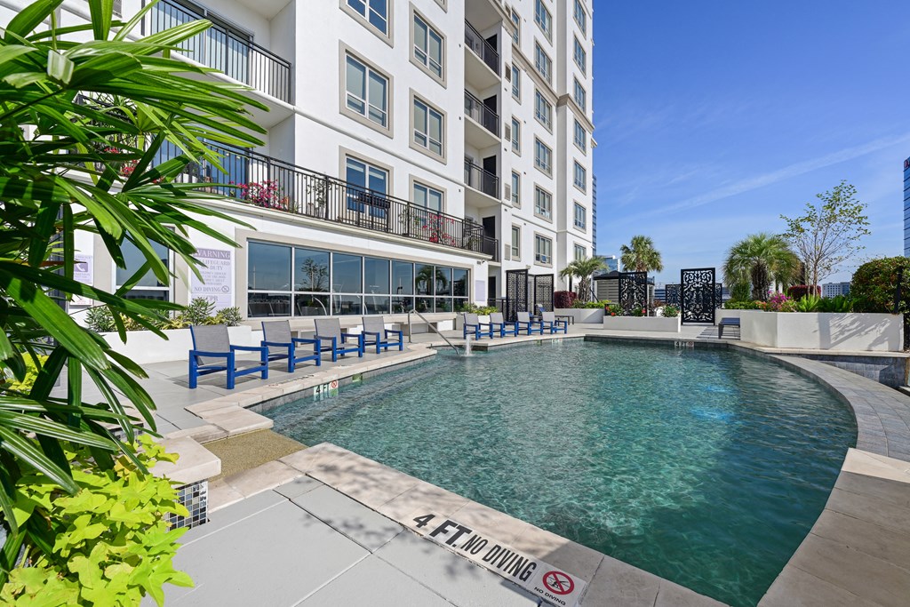Our sparkling pool on the rooftop patio at Dominion Post Oak apartments in Houston, TX