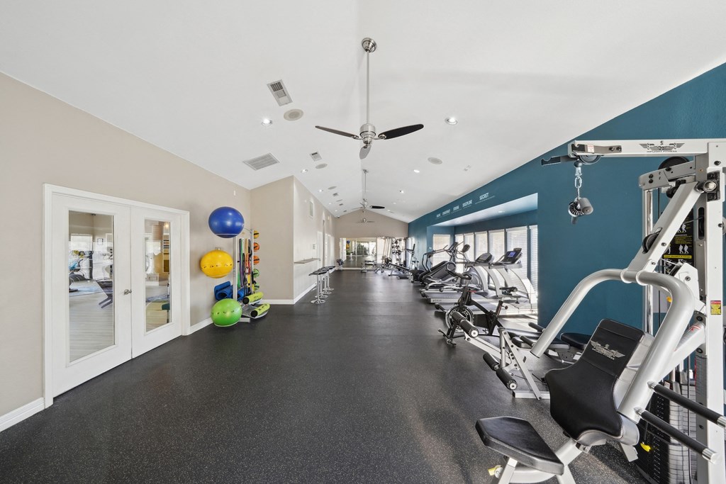 View of entire fitness room at Davenport Apartments in Dallas, TX