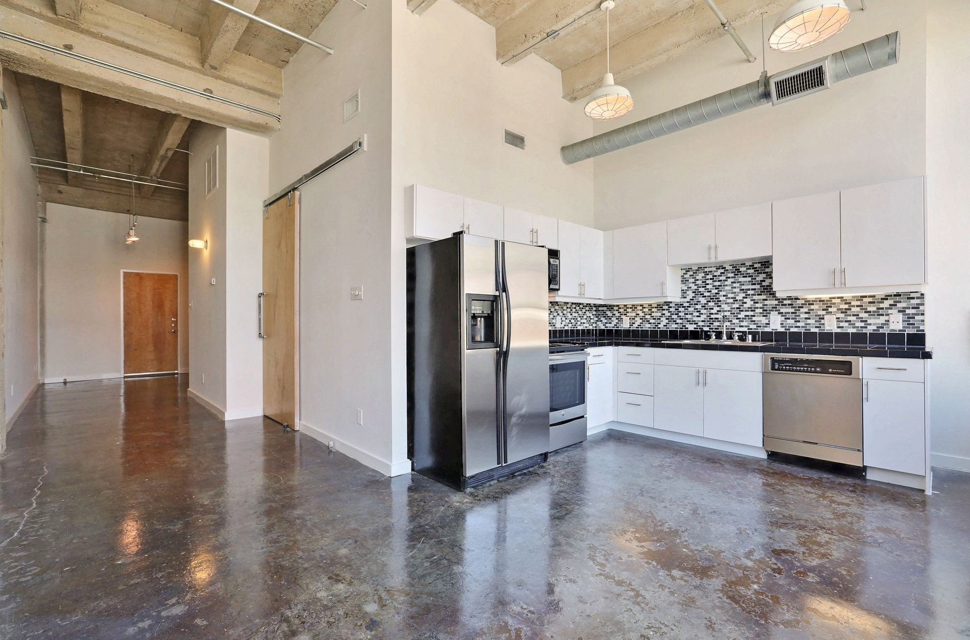 Unit 307 Kitchen and Living at Futura Lofts in Deep Ellum, Dallas, Texas, TX