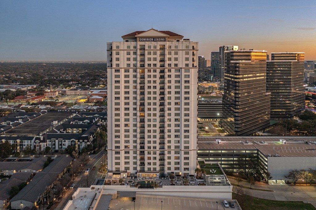 an aerial view of the Dominion Post Oak at dusk in Houston, TX