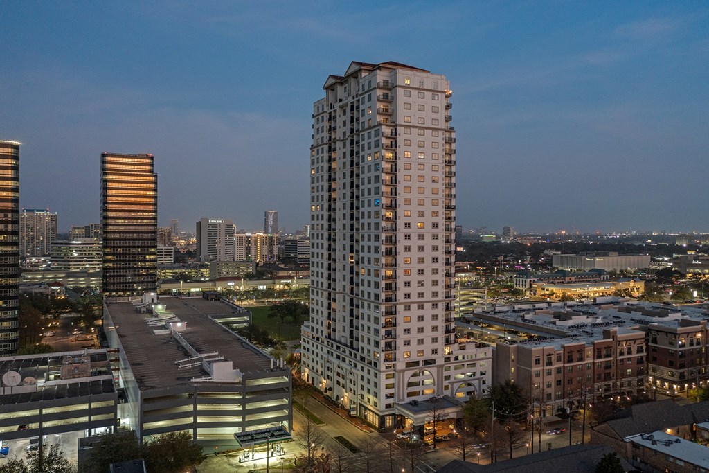 a view at night of the building at Dominion Post Oak in Houston, TX