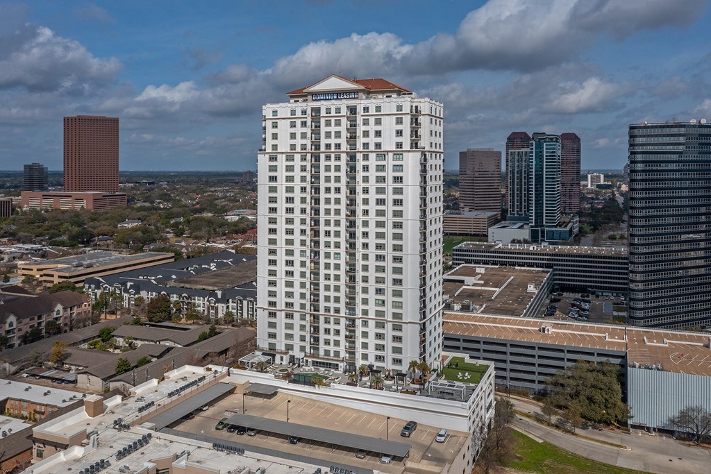 an aerial view of the aprtmnent white building  in Houston, TX