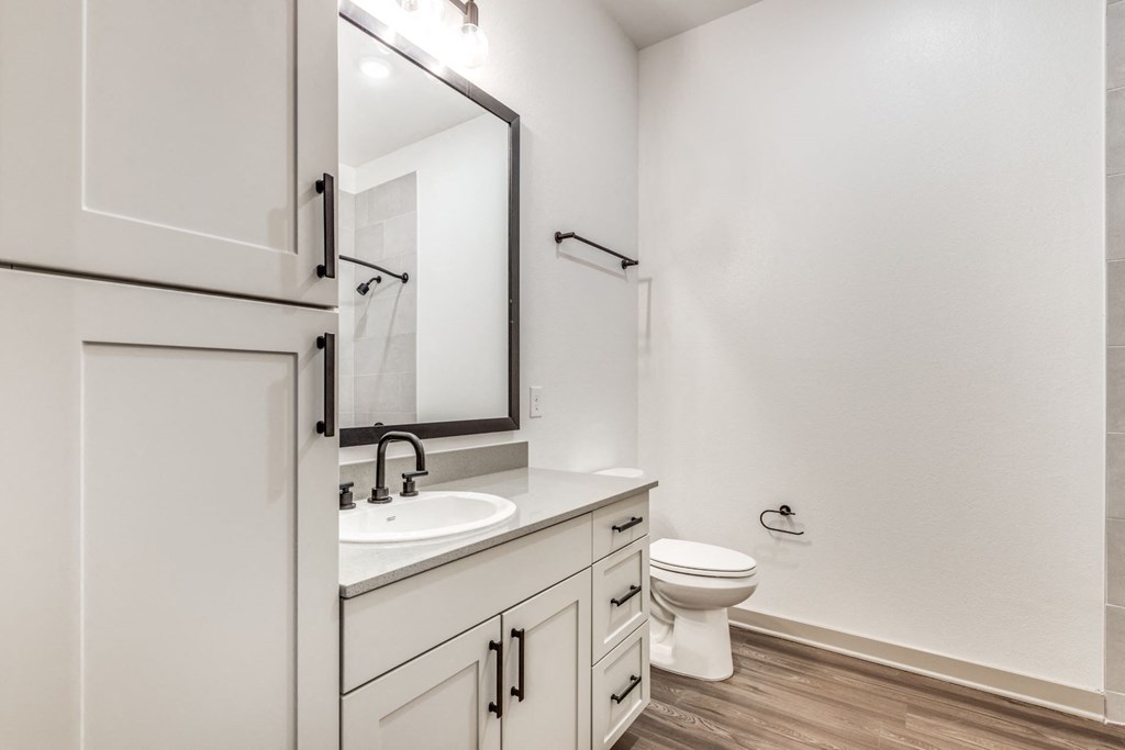 Modern Bathroom with Elegant Fixtures at Era Apartment in Denton, TX