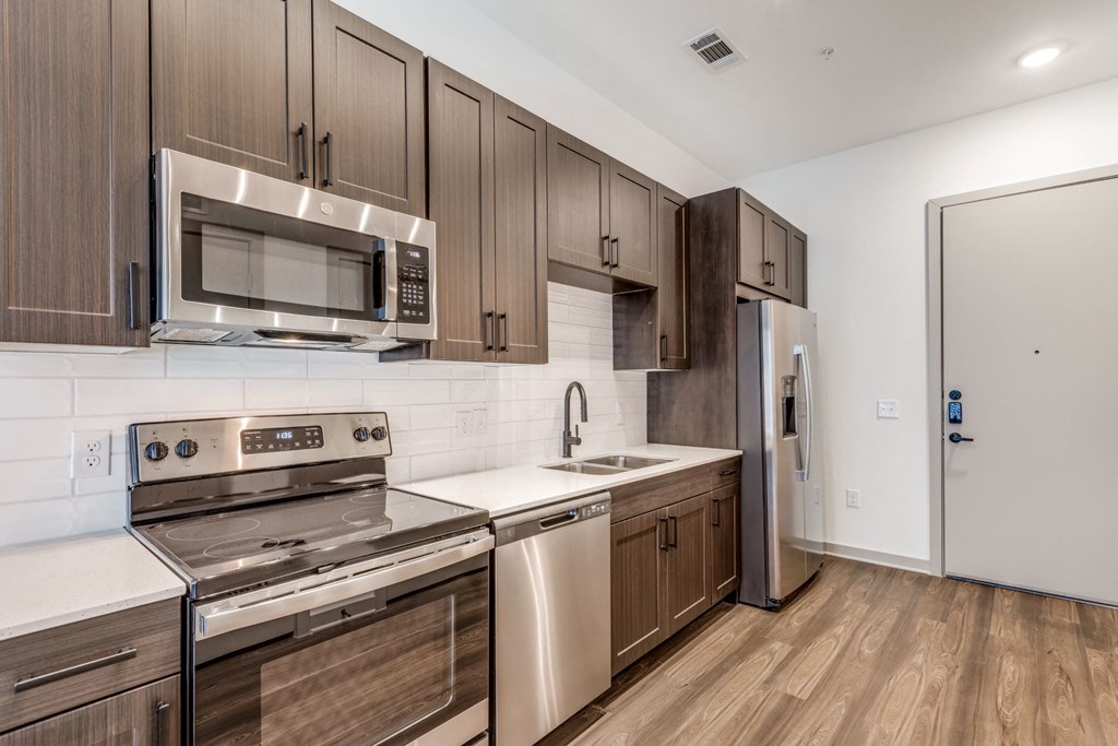 Spacious Kitchen with Contemporary Design at Era Apartment in Denton, TX