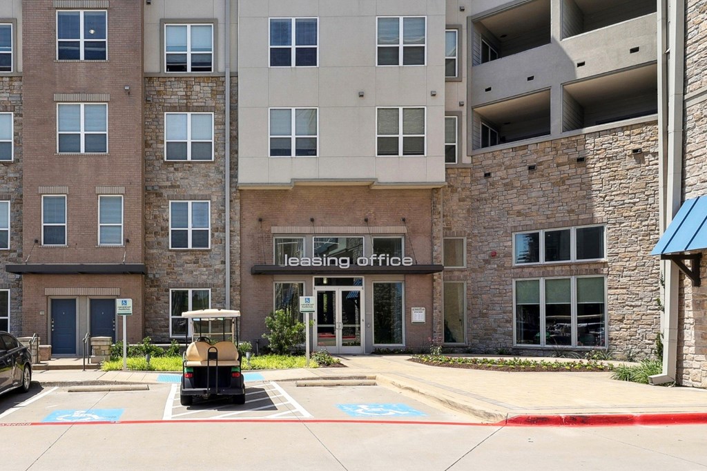 Entrance to leasing office at GreenVue apartments in Richardson, TX