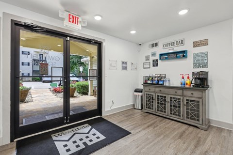 A leasing office with a coffee bar at Gwinnett Square Apartments in Duluth, GA