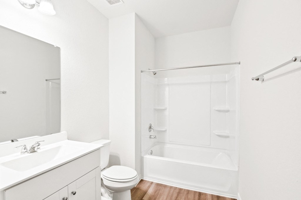 a bathroom with a sink toilet and shower at Beacon at Meridian, San Antonio, TX