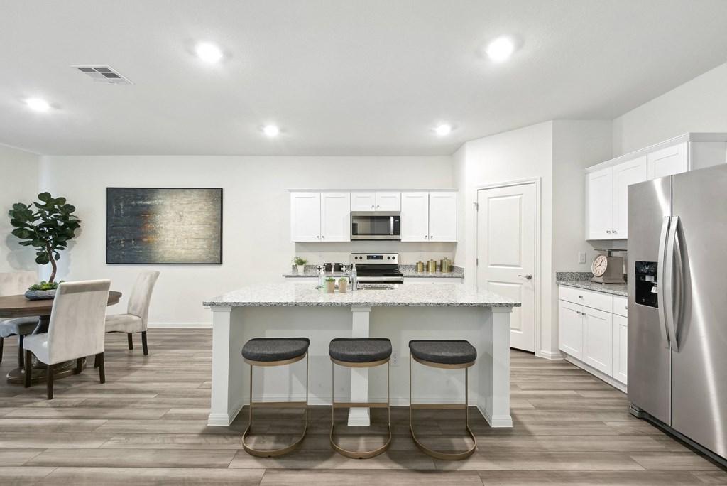 kitchen with white cabinets and stainless steel appliances