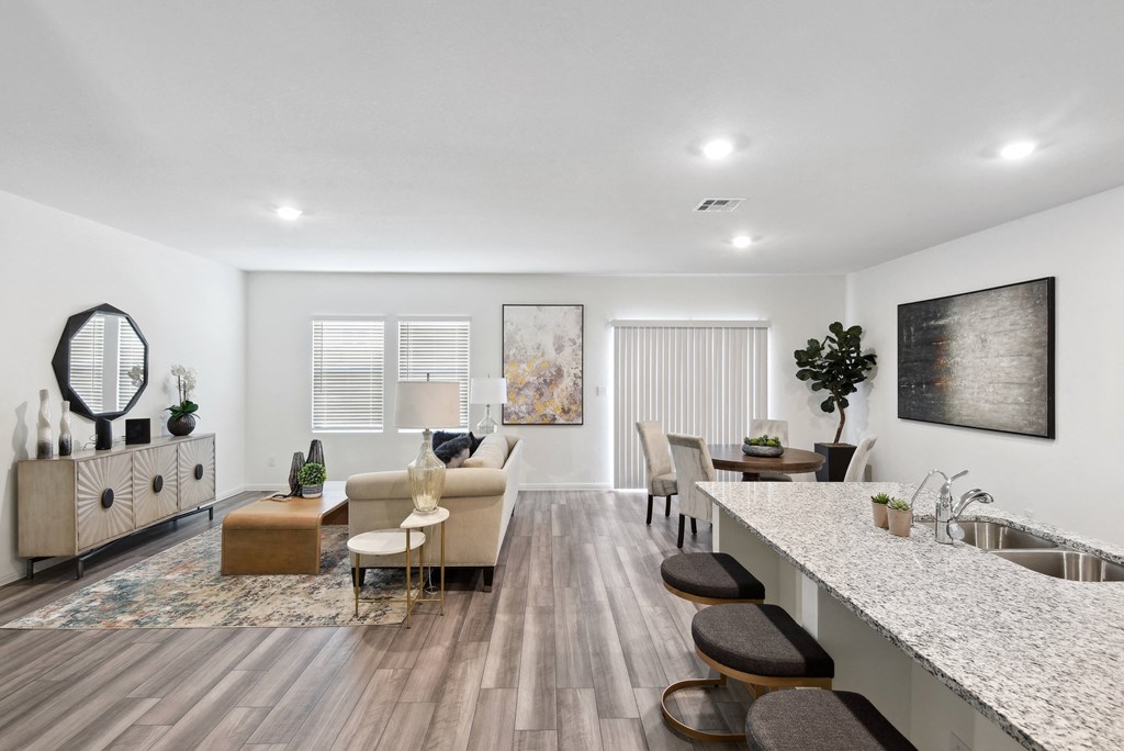 living room and dining room with contemporary furnitures and white walls