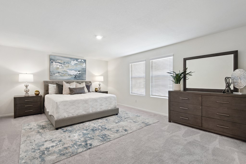 bedroom with dresser and mirror
