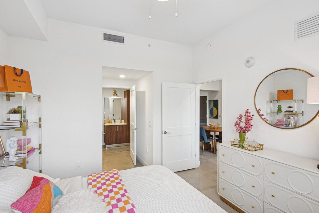 Second bedroom with a bed, nightstand in our 2-bedroom model at Hollywood Heights on the Boulevard Luxury Apartments in Hollywood, FL