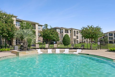 Swimming pool at Hilltops Apartments in Conroe, TX