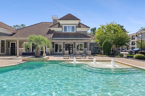 Swimming pool at Hilltops Apartments in Conroe, TX