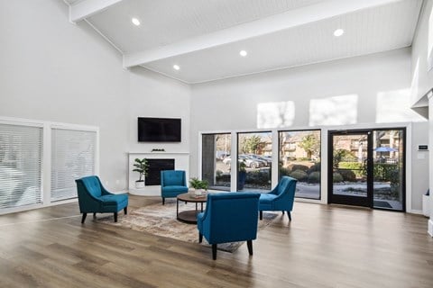 the preserve at ballantyne commons living room with blue chairs