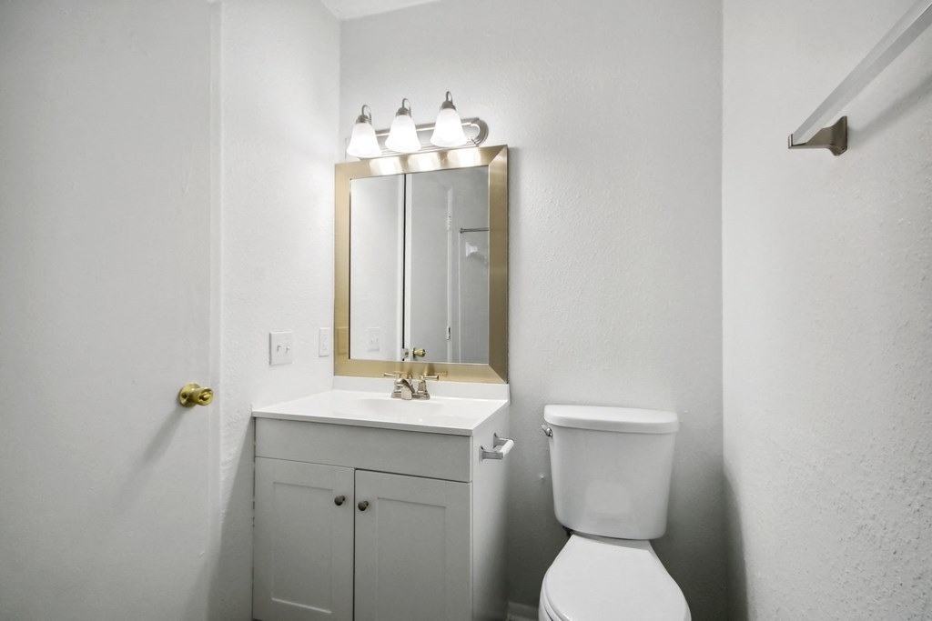 a bathroom with white cabinets at Johnston Creek Crossing in Charlotte, NC