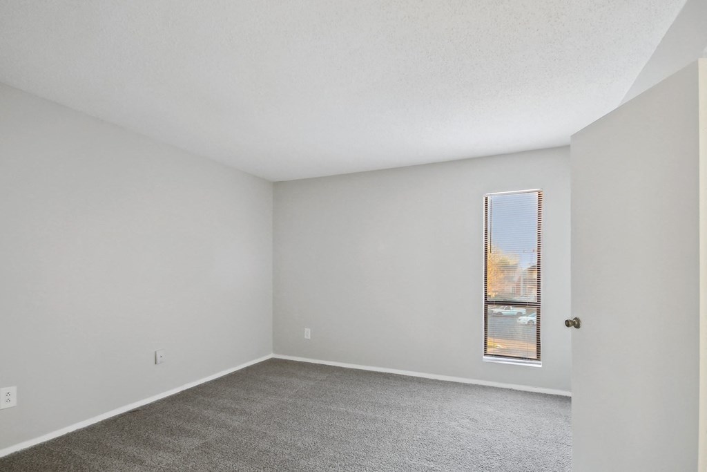 bedroom with white walls at Johnston Creek Crossing in Charlotte, NC