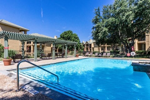 the swimming pool at the falls at rolland park apartments