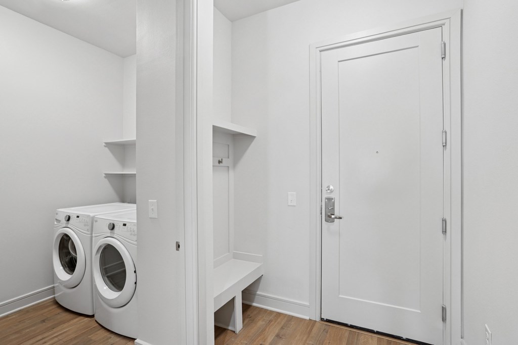 Entry way to B8 floor plan with a mudroom and laundry room at Knox Heights Apartments in Dallas, TX