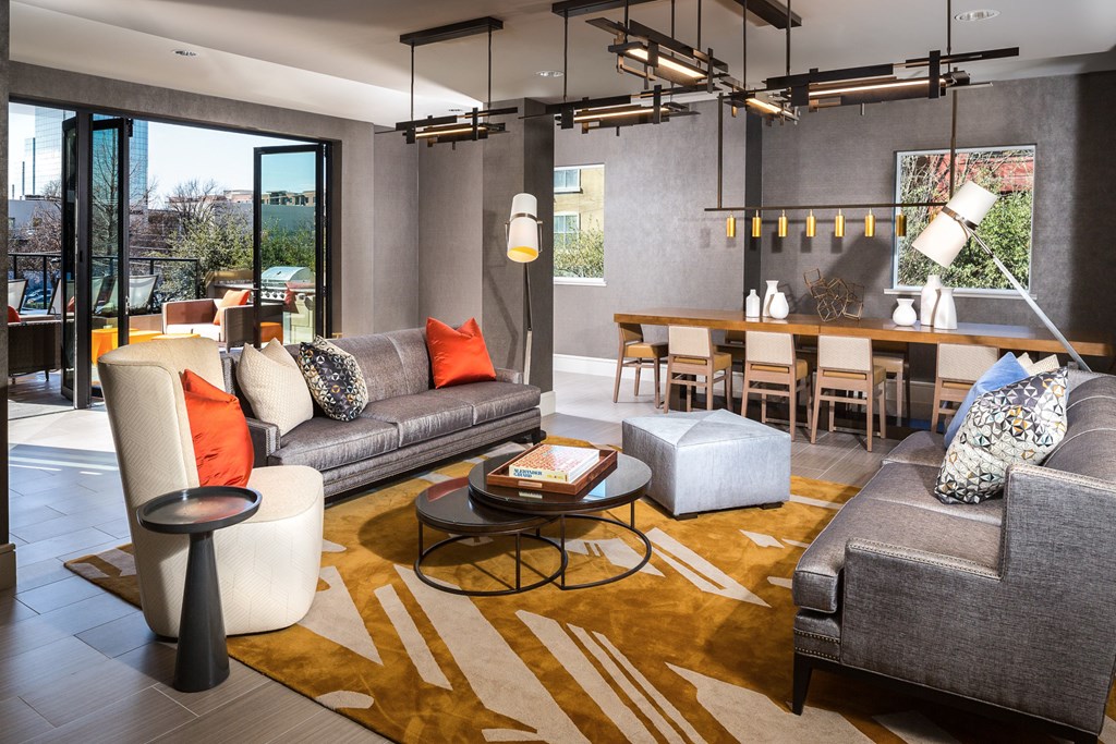 clubhouse with couches and coffee table at Knox Heights in Dallas, TX