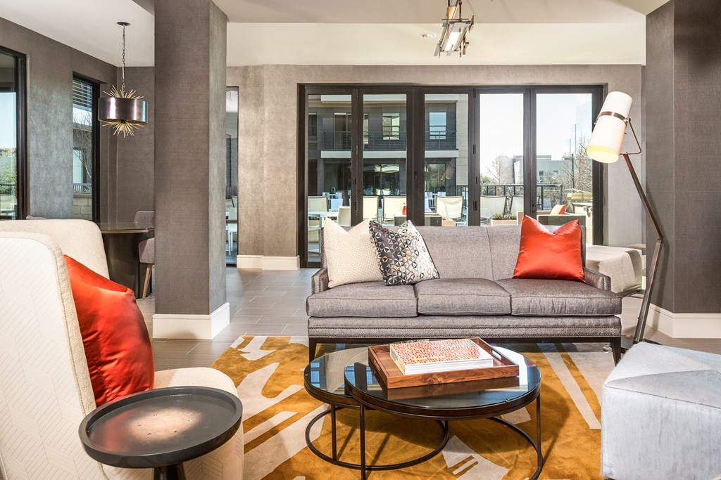 clubhouse with couches and coffee table at Knox Heights in Dallas, TX