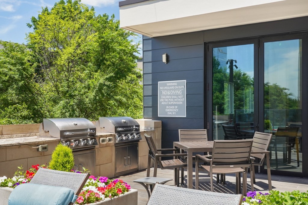 two bbq grills on the patio at Knox Heights in Dallas, TX