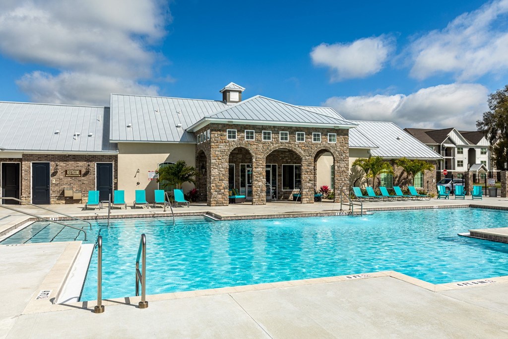 the pool at the club at highland village apartments