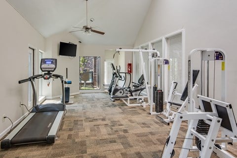 the gym with treadmills and other exercise equipment at 1861 muleshoe road